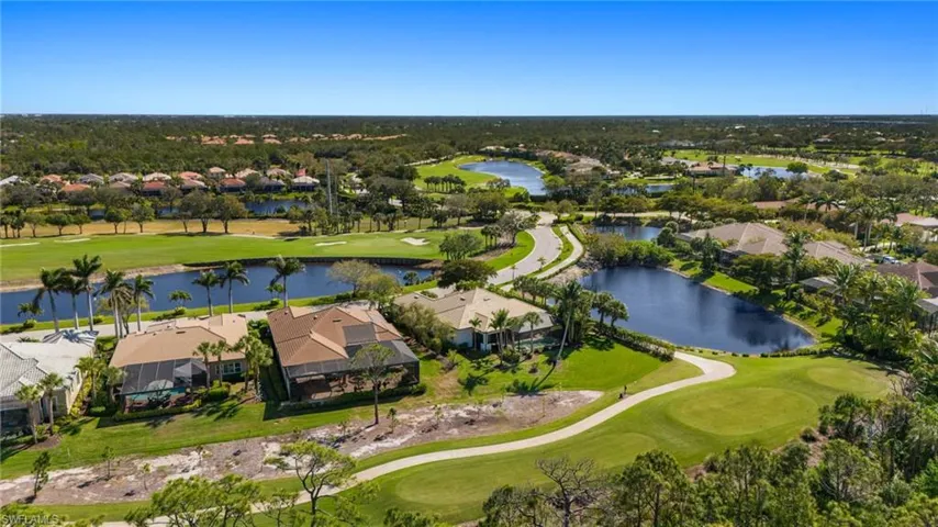 Bird's eye view featuring a water view, a residential view, and golf course view