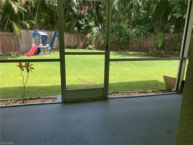 Doorway featuring concrete flooring