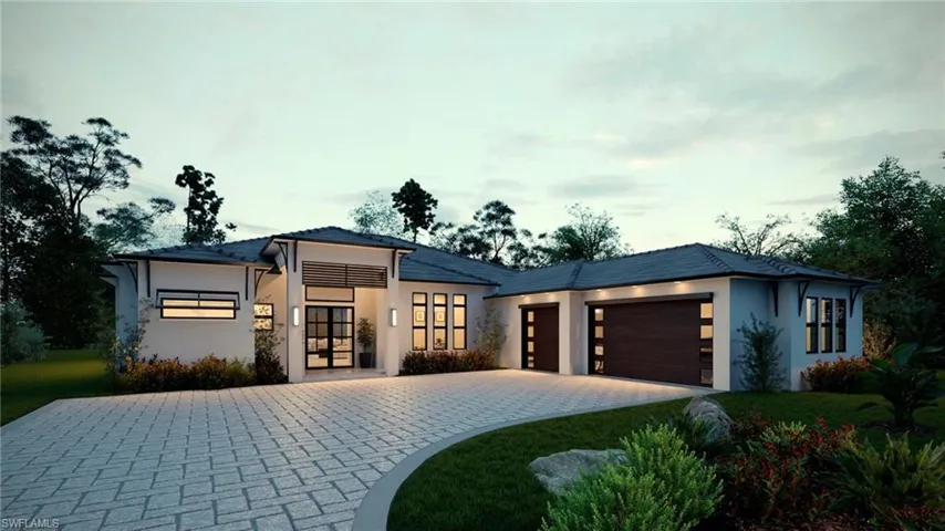 Single-story exterior featuring a light-toned stucco facade, dual-paneled garage doors with inset glass, a wide paver driveway, and an expansive covered entryway with integrated wall-mounted lighting