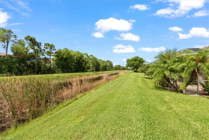 View of green lawn canal