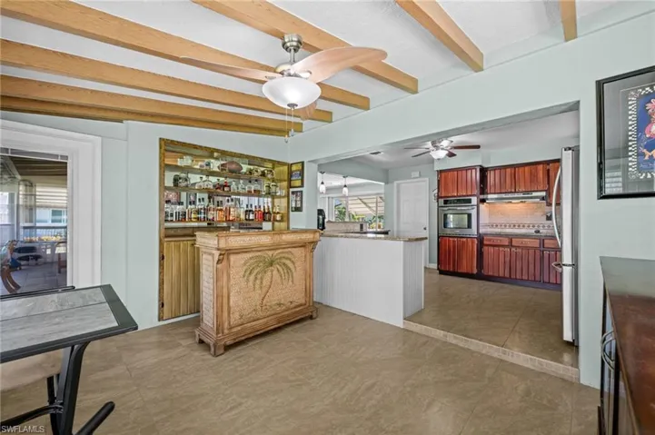 Charming ceiling beams add character to this room.