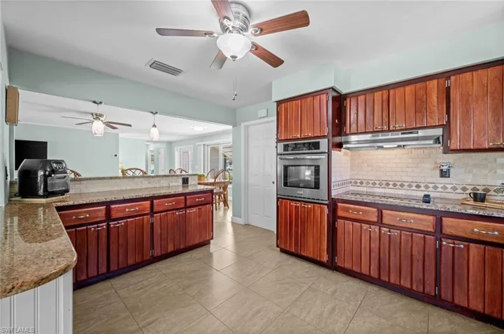 Spacious kitchen with plenty of cabinet storage.
