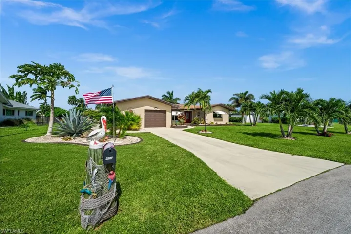 Nicely landscaped property with plenty of curb appeal.