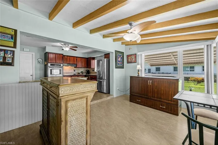 Enjoy peaceful canal views from this comfortable sitting area.