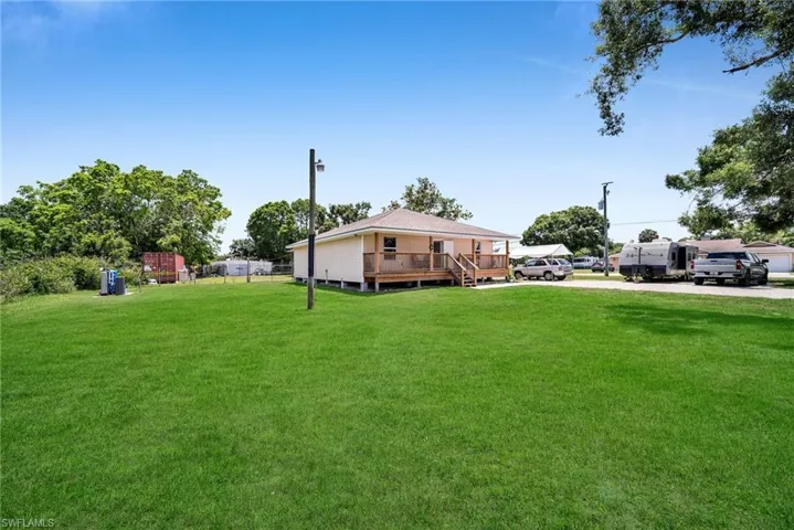 View of yard with a deck