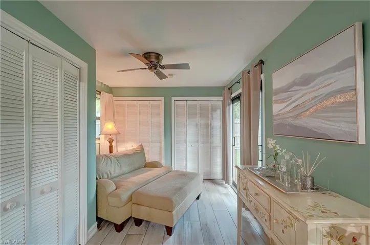 Master bedroom sitting area with walk-out to backyard