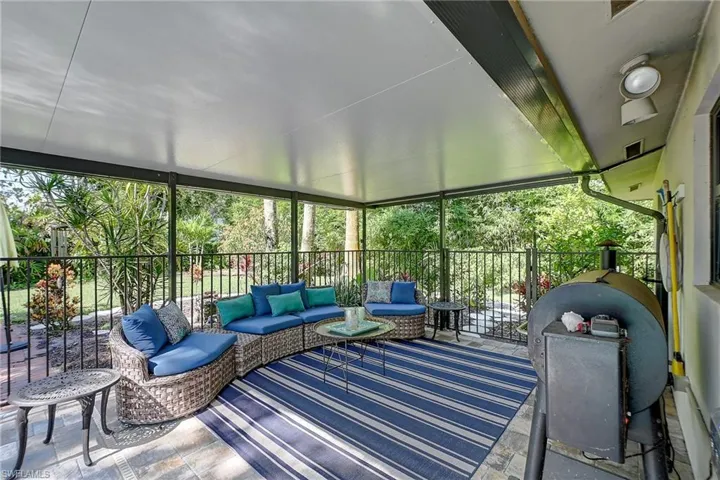 covered patio overlooking the large pool