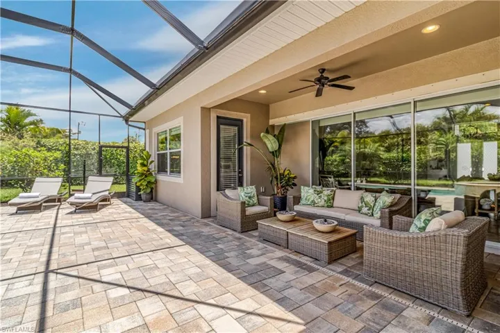 View of lanaifeaturing ceiling fan, and an outdoor hangout area