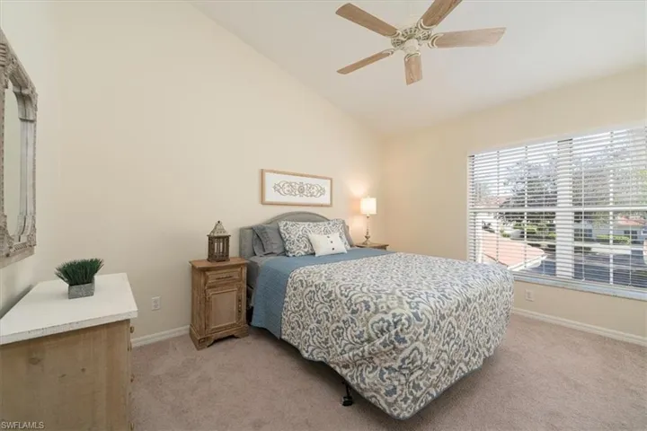 Guest bedroom with sunrise view & ceiling fan