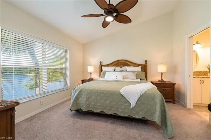 Primary Bedroom with lake views & ensuite bath