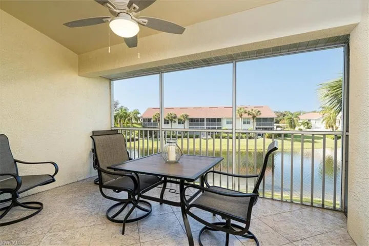 Screened in balcony off Living room with views of lake