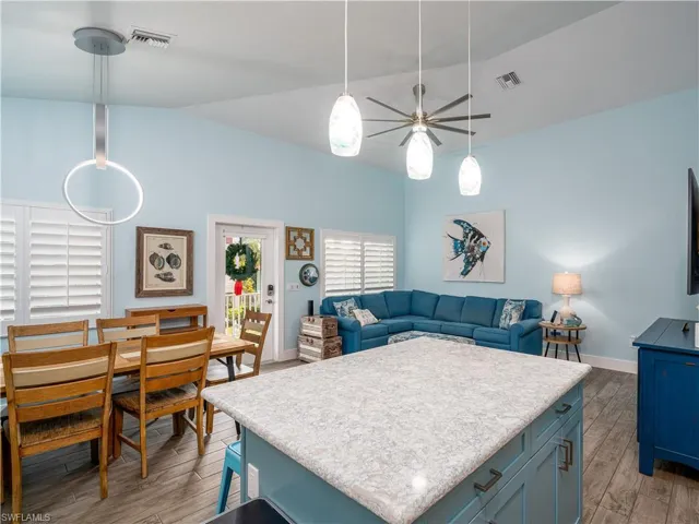 VIEW FROM KITCHEN TO LIVING AND DINING AREA.