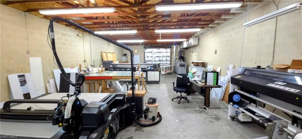 Garage featuring a workshop area