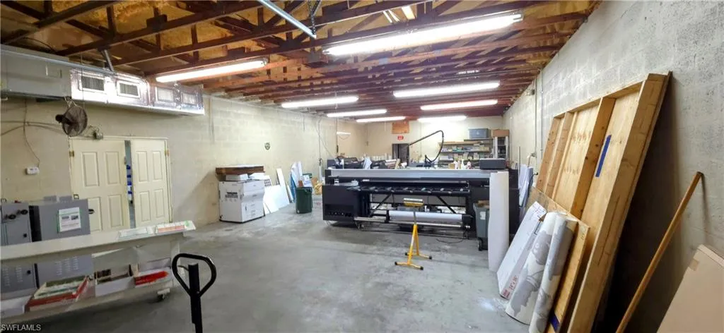 Garage featuring a workshop area