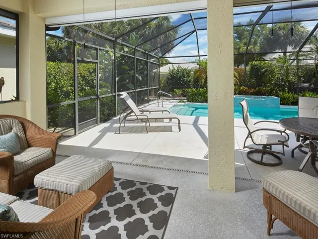 Covered lanai with plenty of room for lounging!