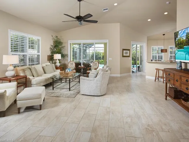 Living, dining and kitchen open to one another.