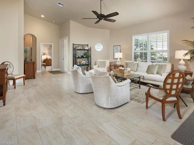 Vaulted ceilings and tile flooring throughout the home.