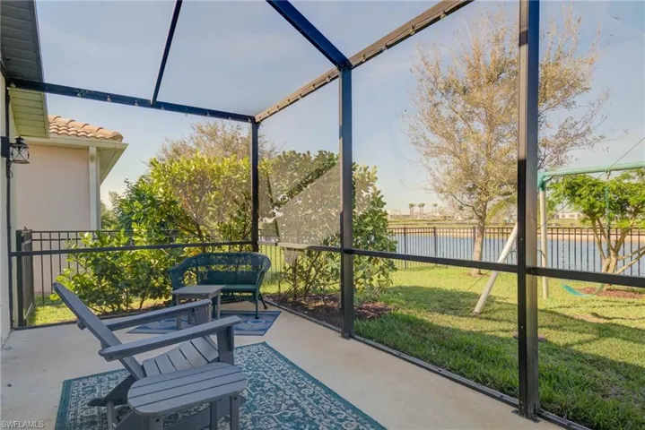 Sunroom / solarium with a water view