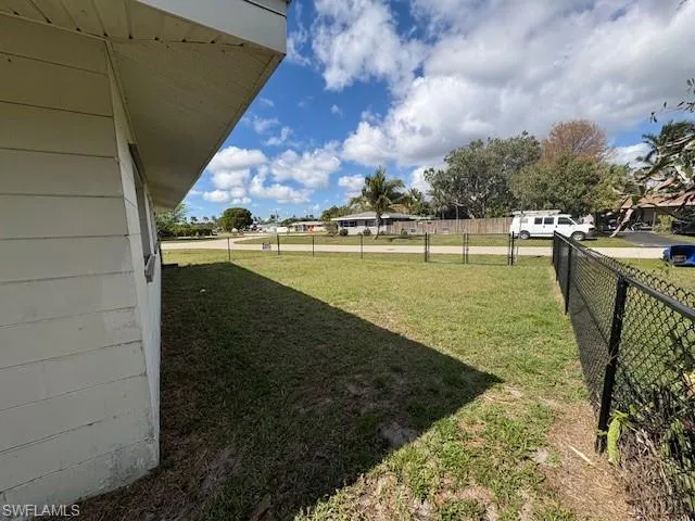 View of yard with fence