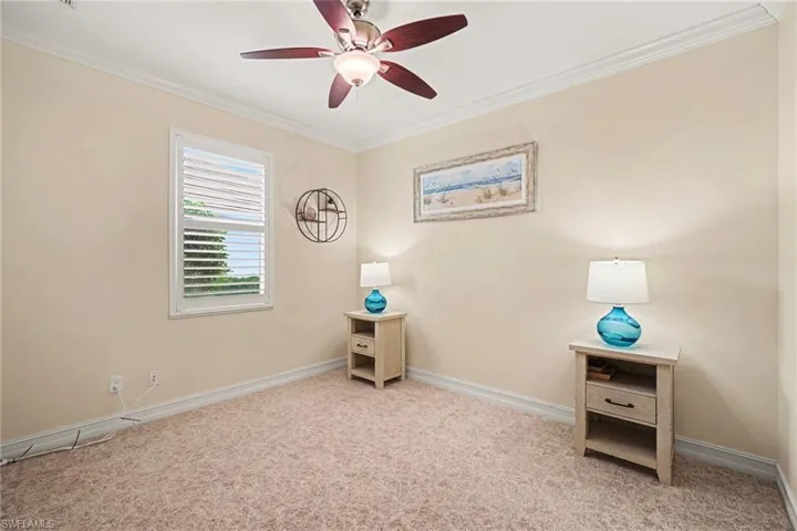 Guest bedroom on opposite side of home from primary offers lots of privacy for guests; walk-in closet