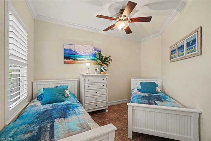 Den #2 currently used as a bedroom for grandkids, double-door entry