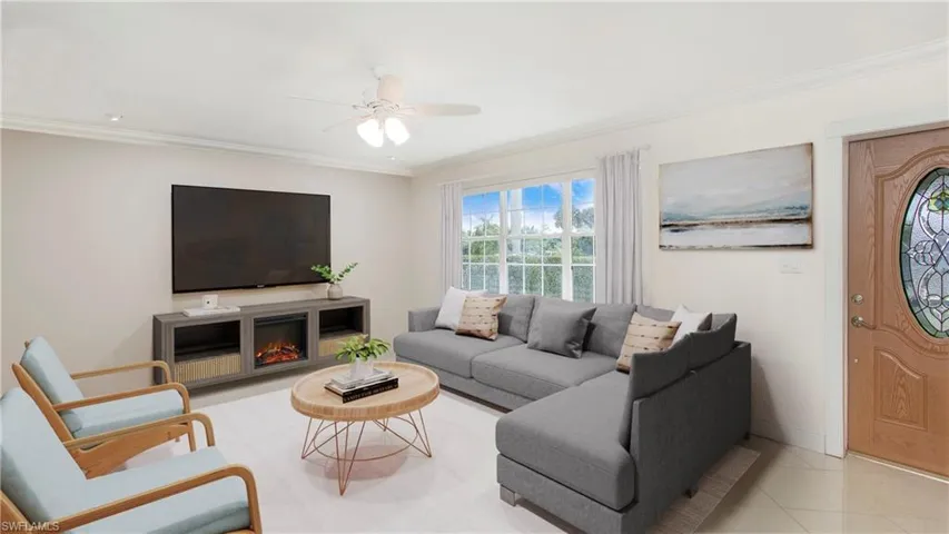 Photo includes reality staging to showcase the possibility of the living room. Design services included with purchase!