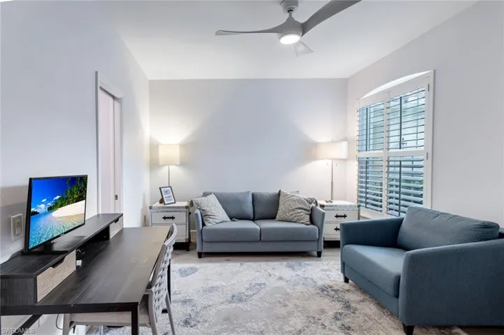 Wonderful Guest bedroom #2 with ceiling fan and plantation shutter adorned window!