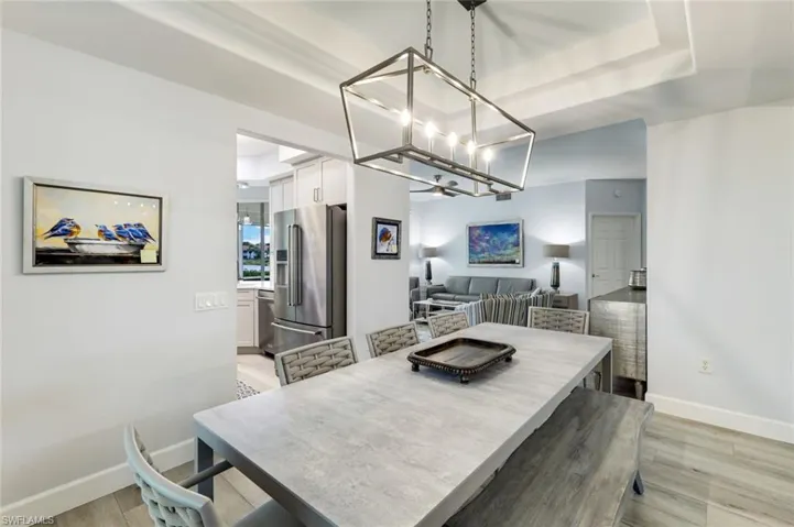 Updated luxury vinyl plank flooring throughout entire home with white crisp updated baseboards throughout!