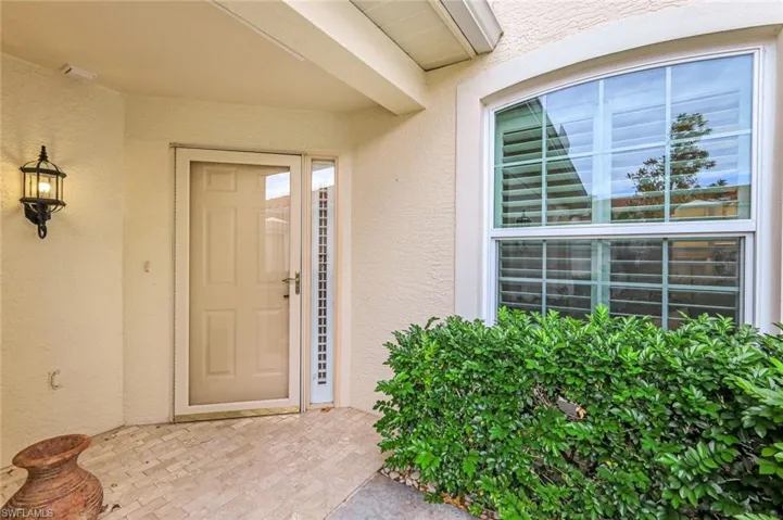 Private covered entrance and ALL HURRICANE IMPACT WINDOWS!