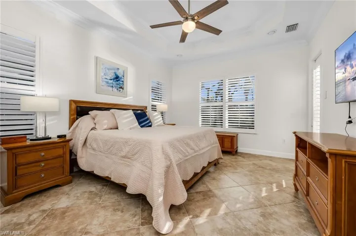 Great space with light tile flooring throughout and custom window treatments