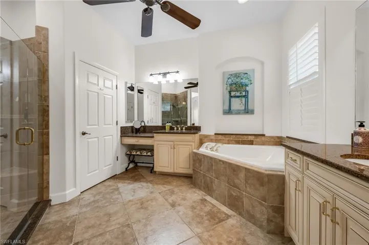 Separate tub and shower with dual sink