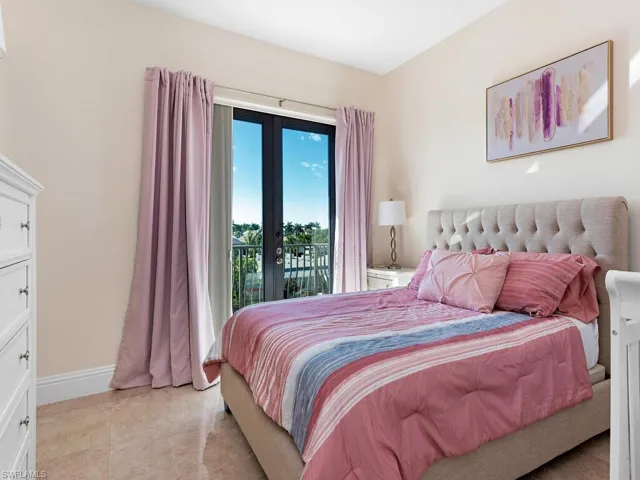 Bedroom featuring french doors and access to outside