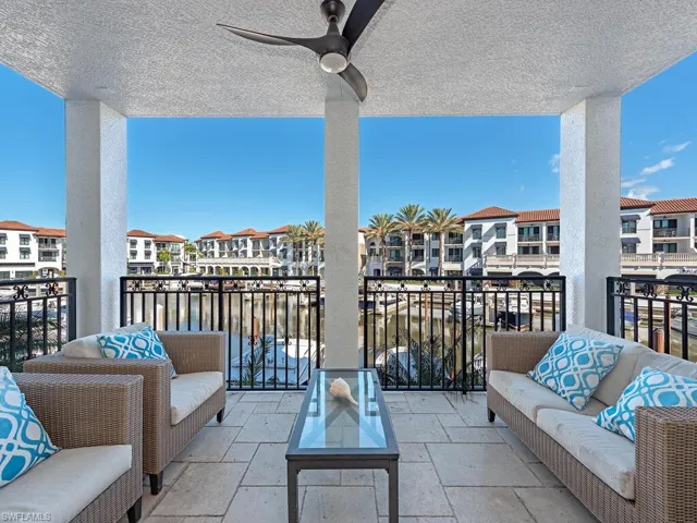 Balcony featuring a ceiling fan and an outdoor living space