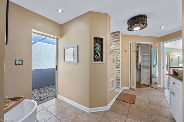 Master Bathroom with Soaking Tub/ mini tv, Private Atrium, Heater feature below shower