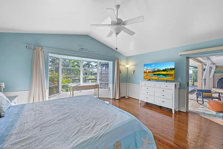 Master with stunning waterfront views and private entrance to pool