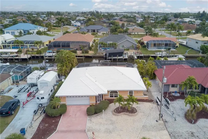 Aerial view of residential area with a large body of water