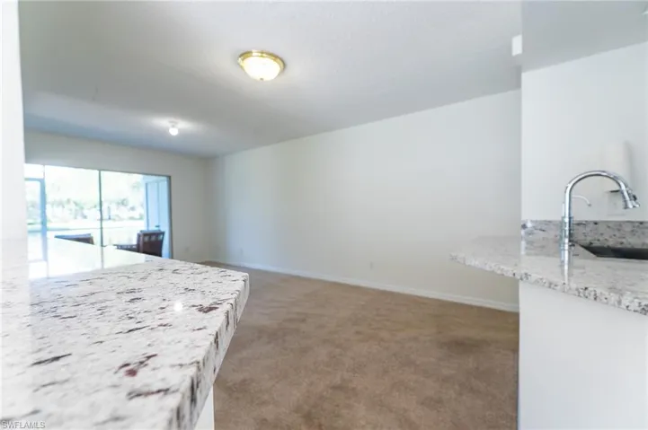View of living room from den hall