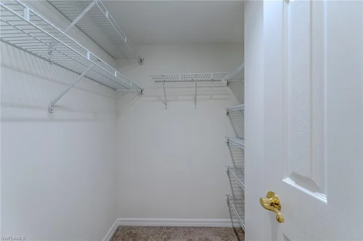 Walk-in closet featuring