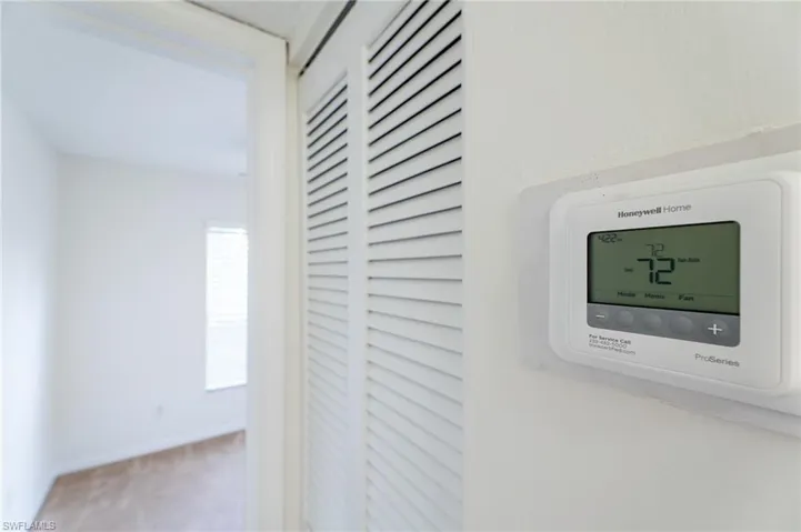 Digital thermostat with a clear display