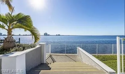 Surrounding community with a water view