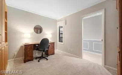 Home office with light colored carpet