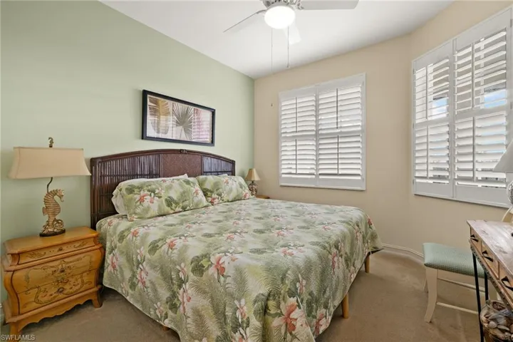 Plantation shutter in guest bedroom.