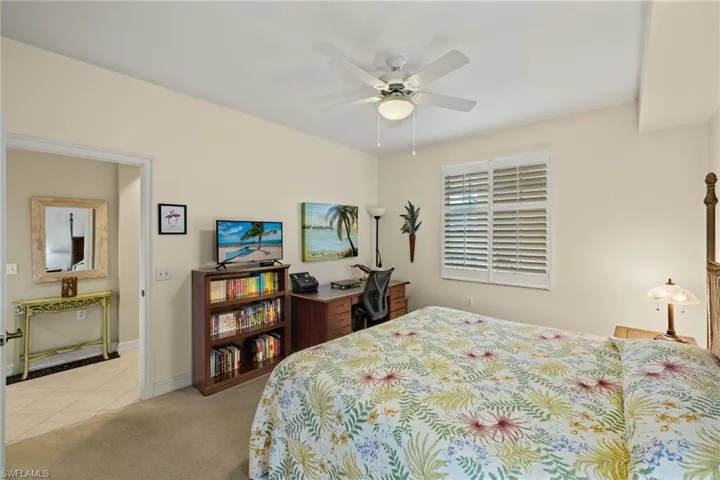 Plantation shutter in primary bedroom.