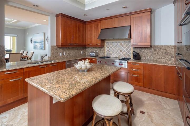 Spacious kitchen with views out to the beach