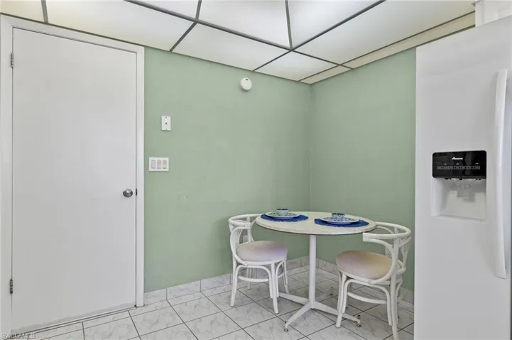 Dining room featuring light tile floors