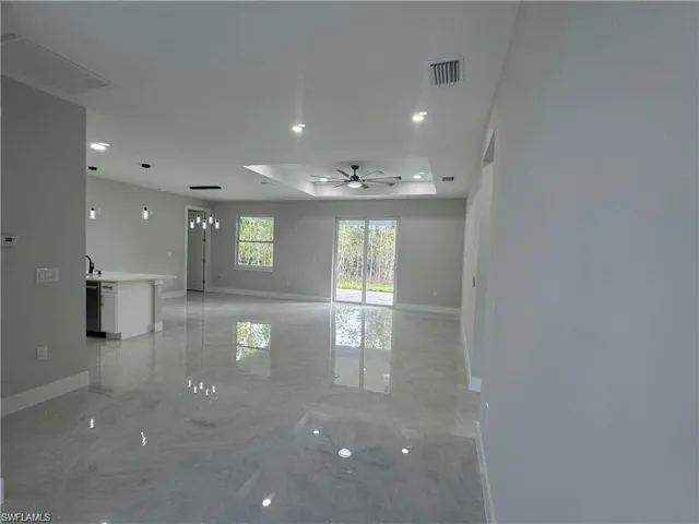 View of yard with a garage