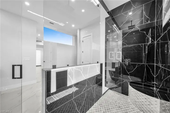 Bathroom featuring an enclosed shower