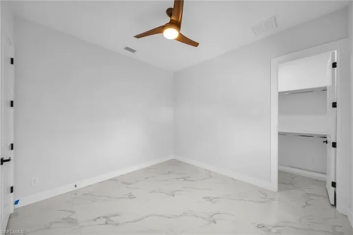 Empty room with ceiling fan