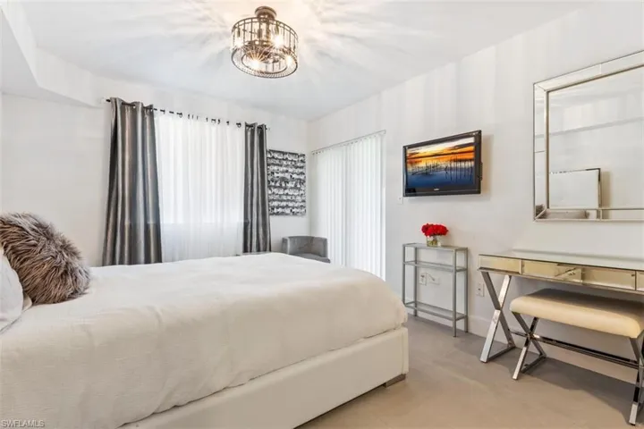 Bedroom with a chandelier