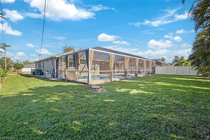Rear view of property and garden area